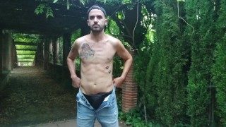 Xisco go to cruising in Barcelona for finally jerk off in the park but with a guy watching him close